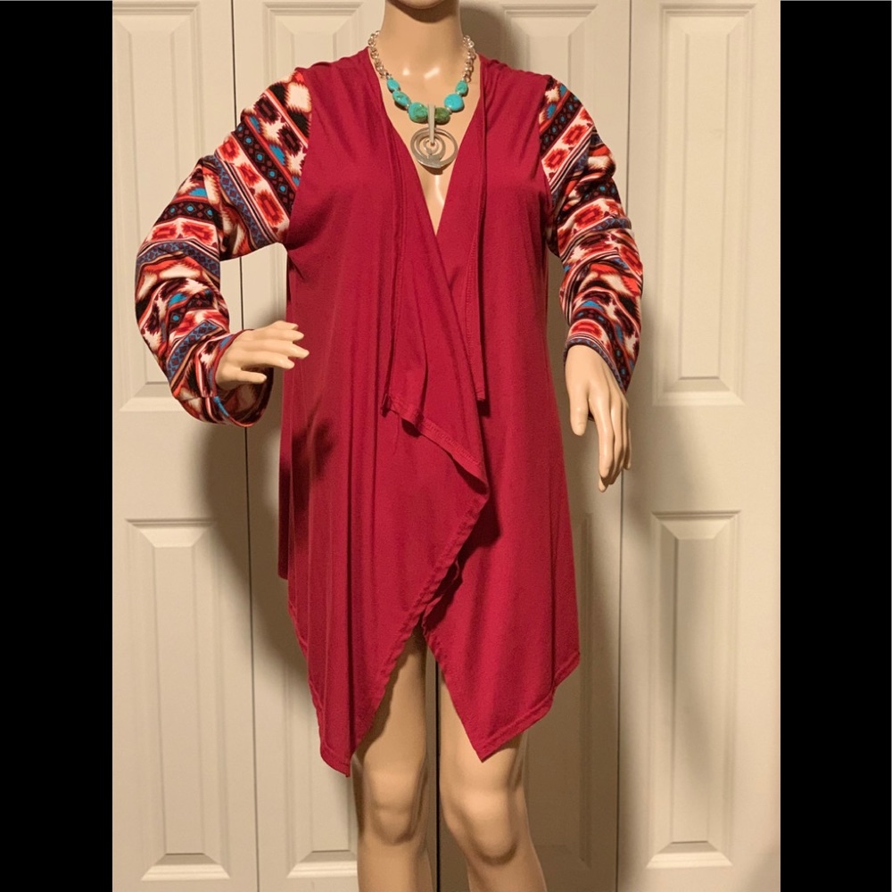 Ladies red cardigan with southwest pattern sleeves and draped opening. Size 2X